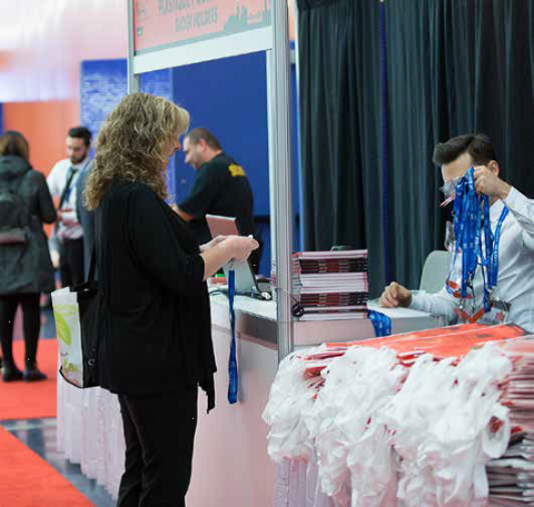 Picture of DISTRIBUTING PROMOTIONAL ITEMS AT THE SHOW ENTRANCES